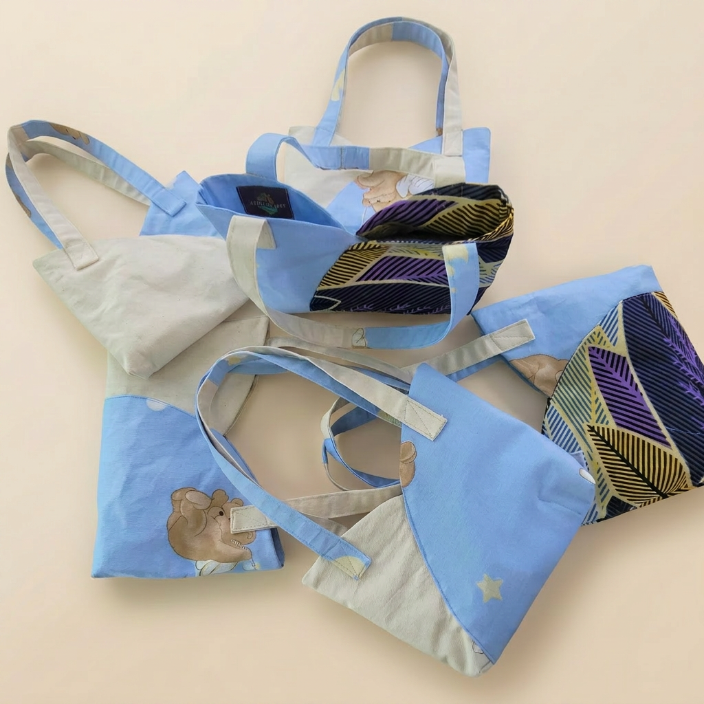 Children's mini tote bags in blue with bear motifs and African print